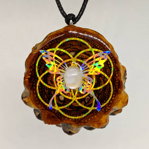 Gold Lazer seed of life with rainbow metallic butterfly and moonstone