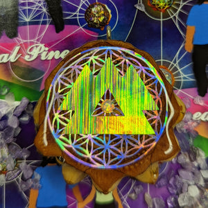 Wakaan over flower of life with opal green laser